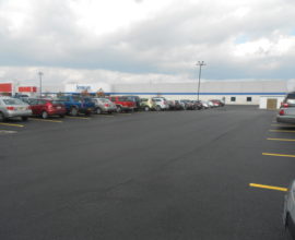 packed parking lot with sutherland building