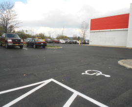 new parking lot paved with car on top