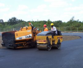 two workers on the pavement