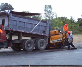 dumping pavement onto the ground